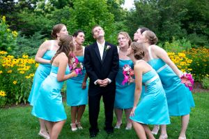bridesmaids kiss the groom