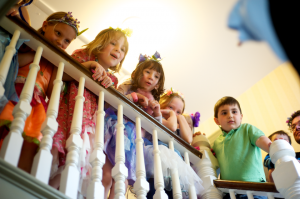 children looking over the banister