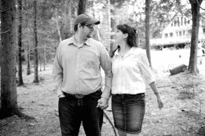 Maine bride and groom take walk in the woods