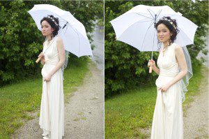bride carries a white umbrella