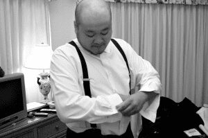 groom getting ready for Maine wedding