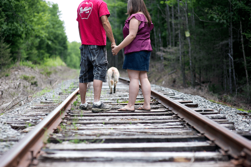engagement photo on Maine railroad tracks