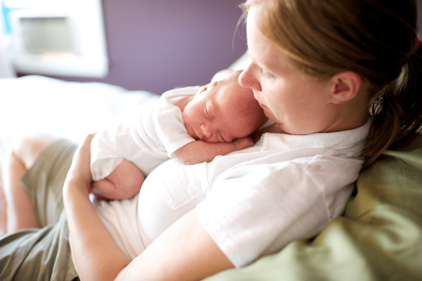 baby rests on mother's chest