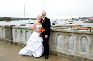 Maine wedding bride and groom on footbridge