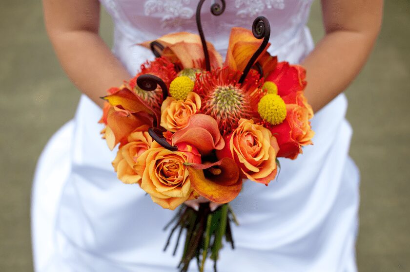 red orange and yellow Fall Maine wedding flowers