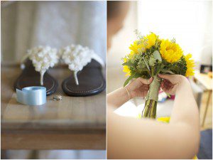 bride pins her sorority ring to her bouquet