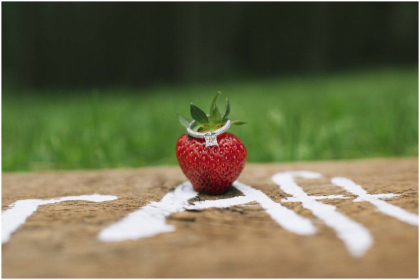 engagement ring on strawberry