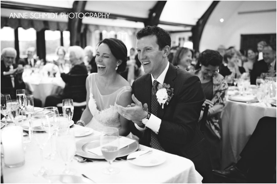 laughing couple wedding reception toasts
